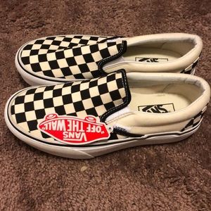 Vans checkered slip ons